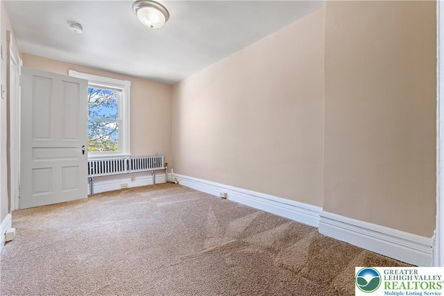 343 N 16th St, Allentown City, PA 18102 - unfurnished room with carpet flooring, a smoke detector, and baseboards