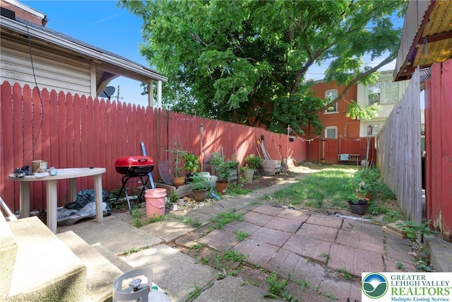 343 N 16th St, Allentown City, PA 18102 - fenced backyard featuring a patio area and a grill