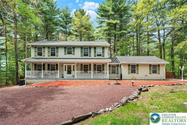 146 Bernadette Dr, Pike, PA 18328 - colonial-style house featuring a porch