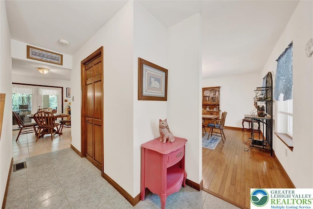 146 Bernadette Dr, Pike, PA 18328 - hallway with baseboards and light tile patterned floors