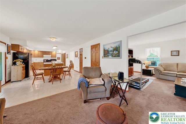 146 Bernadette Dr, Pike, PA 18328 - living room with light colored carpet and light tile patterned floors