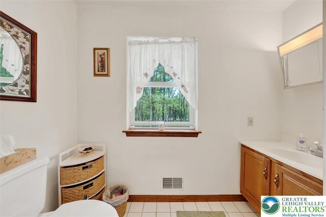 146 Bernadette Dr, Pike, PA 18328 - bathroom with toilet, vanity, tile patterned flooring, and baseboards