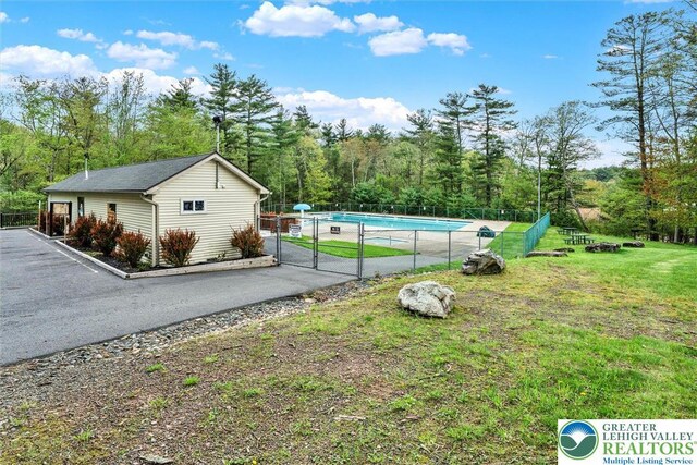 146 Bernadette Dr, Pike, PA 18328 - view of home's exterior with a wooded view