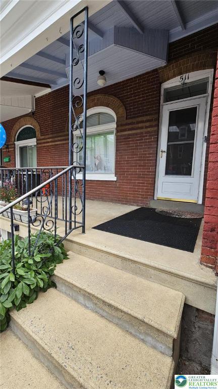 511 N 8th St, Allentown City, PA 18102 - property entrance with brick siding and a porch