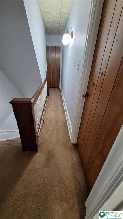 511 N 8th St, Allentown City, PA 18102 - hall with light carpet, an upstairs landing, and baseboards