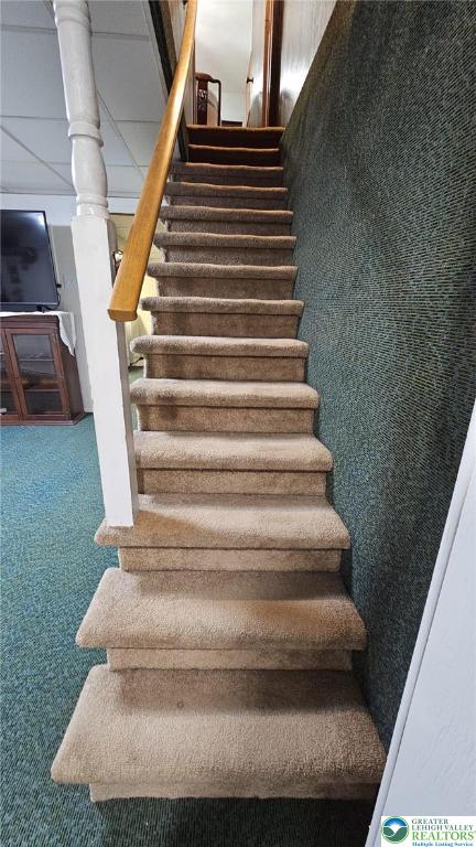 511 N 8th St, Allentown City, PA 18102 - stairway featuring carpet flooring