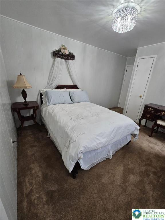 511 N 8th St, Allentown City, PA 18102 - bedroom featuring carpet and a chandelier
