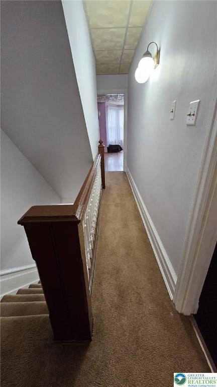511 N 8th St, Allentown City, PA 18102 - hallway with carpet flooring, an upstairs landing, and baseboards