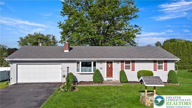 155 7th St, Tatamy Borough, PA 18085 - ranch-style home featuring a chimney, a front yard, driveway, a garage, and roof with shingles