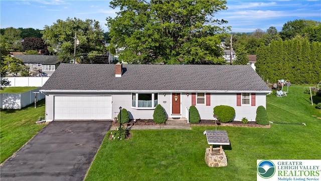 155 7th St, Tatamy Borough, PA 18085 - ranch-style house featuring driveway, a chimney, a front yard, roof with shingles, and a garage