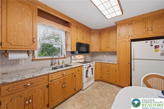 155 7th St, Tatamy Borough, PA 18085 - kitchen with white appliances, a sink, backsplash, and brown cabinetry