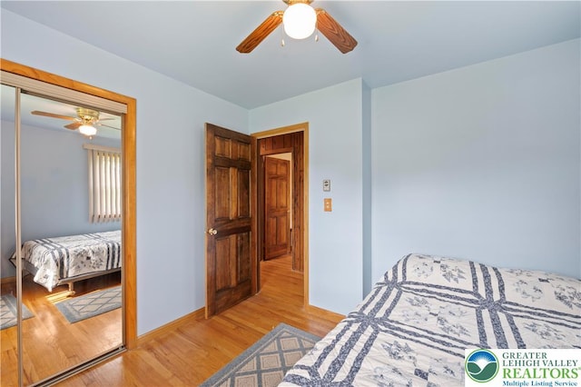 155 7th St, Tatamy Borough, PA 18085 - bedroom featuring light wood finished floors, a closet, baseboards, and ceiling fan