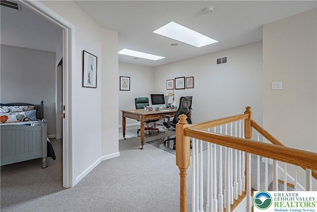 538 Parkside Ct, Allentown City, PA 18104 - carpeted home office featuring a skylight and baseboards