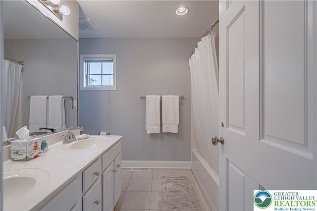 538 Parkside Ct, Allentown City, PA 18104 - full bathroom featuring double vanity, baseboards, and shower / bath combo with shower curtain