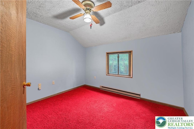 1117 Belaire Dr, Stroud Twp, PA 18301 - spare room with a baseboard radiator, a textured ceiling, lofted ceiling, carpet floors, and a ceiling fan