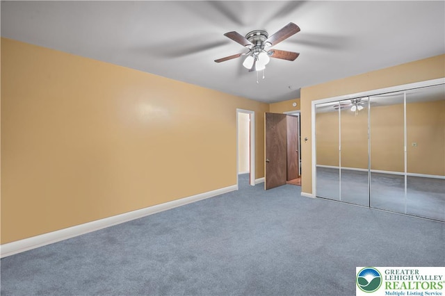 1117 Belaire Dr, Stroud Twp, PA 18301 - unfurnished bedroom with carpet floors, baseboards, a closet, and ceiling fan