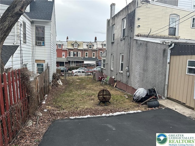 742 N 4th St, Allentown City, PA 18102 - view of side of home featuring an outdoor fire pit