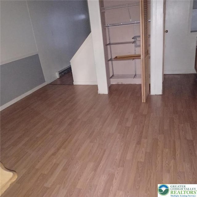 617 Oak St, Allentown City, PA 18102 - basement featuring wood finished floors and baseboards