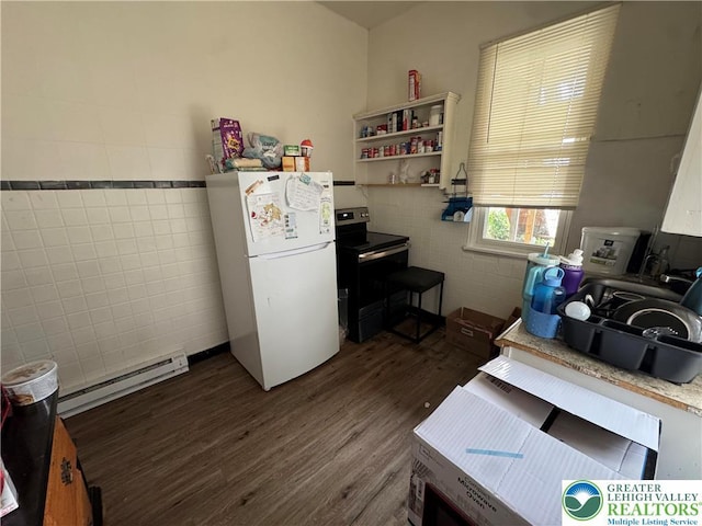 734 W Gordon St, Allentown City, PA 18102 - kitchen featuring freestanding refrigerator, stainless steel electric range, a baseboard heating unit, tile walls, and dark wood finished floors