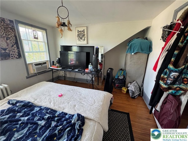 734 W Gordon St, Allentown City, PA 18102 - bedroom featuring wood finished floors and radiator heating unit