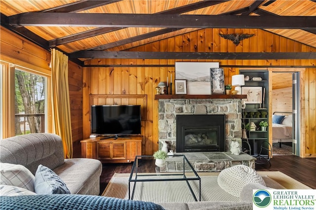 105 Honovi Dr, Tobyhanna Twp, PA 18347 - living room with wood walls, wood-type flooring, wooden ceiling, and a stone fireplace