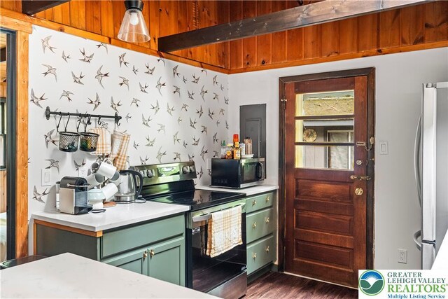 105 Honovi Dr, Tobyhanna Twp, PA 18347 - kitchen with green cabinets, appliances with stainless steel finishes, light countertops, and dark wood finished floors