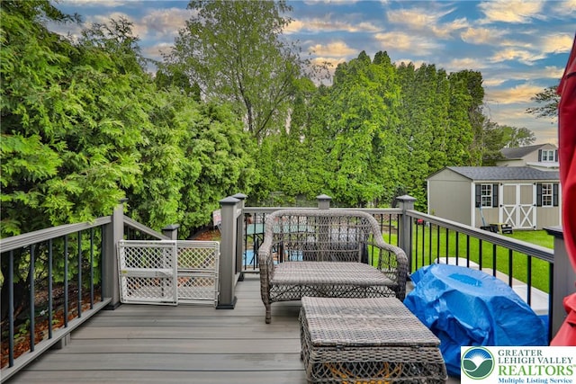 48 Craigie St, Easton, PA 18045 - deck at dusk with a lawn and view of wooded area