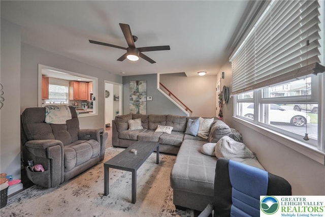 48 Craigie St, Easton, PA 18045 - living room featuring a ceiling fan and stairs