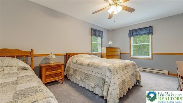 54 Indian Trl, Penn Forest Township, PA 18229 - bedroom featuring a baseboard heating unit, carpet floors, a ceiling fan, and baseboards