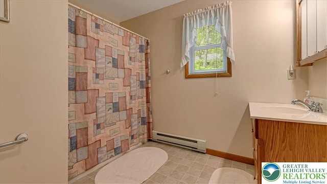 54 Indian Trl, Penn Forest Township, PA 18229 - full bath with a baseboard radiator, vanity, curtained shower, and toilet