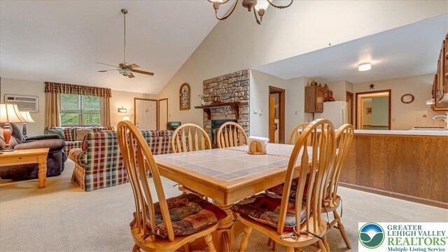54 Indian Trl, Penn Forest Township, PA 18229 - dining area featuring light colored carpet, a fireplace, high vaulted ceiling, and ceiling fan