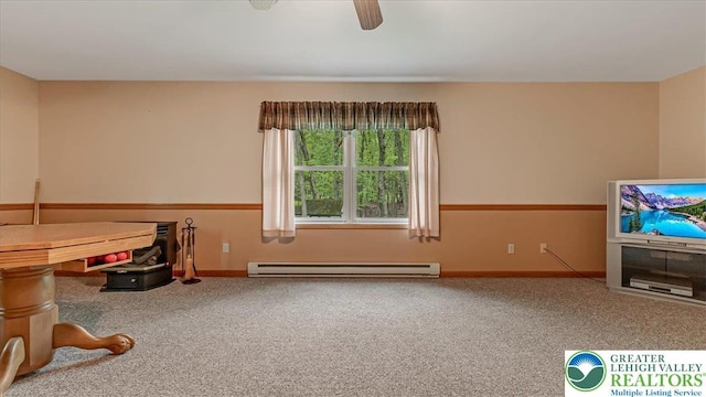 54 Indian Trl, Penn Forest Township, PA 18229 - recreation room featuring a baseboard heating unit, carpet flooring, ceiling fan, and baseboards