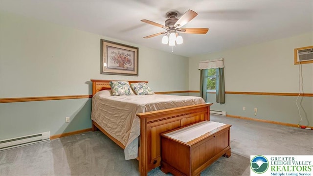54 Indian Trl, Penn Forest Township, PA 18229 - carpeted bedroom with a baseboard radiator, baseboards, a wall mounted air conditioner, and a ceiling fan