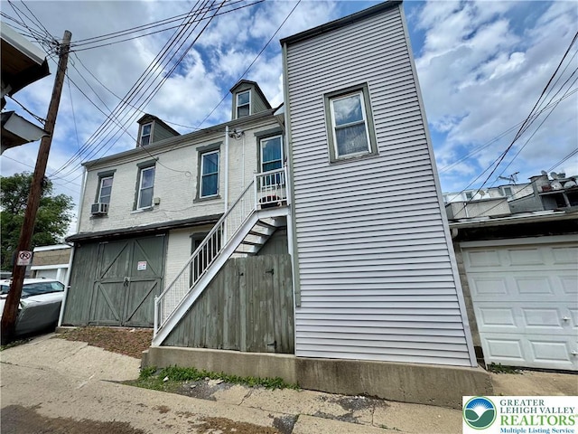 528 N 6th St, Allentown City, PA 18102 - view of front of home with a garage and cooling unit