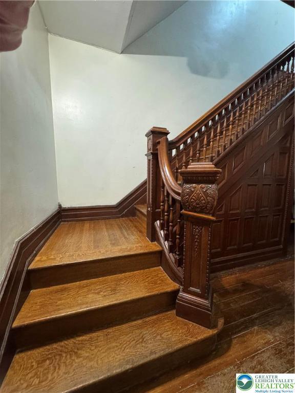 528 N 6th St, Allentown City, PA 18102 - stairs with hardwood / wood-style flooring and baseboards