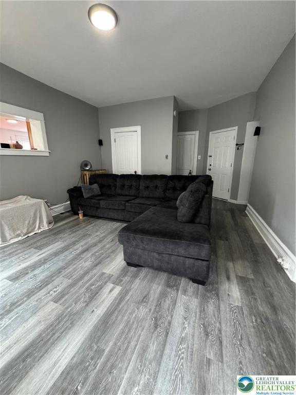 528 N 6th St, Allentown City, PA 18102 - living room with wood finished floors and baseboards