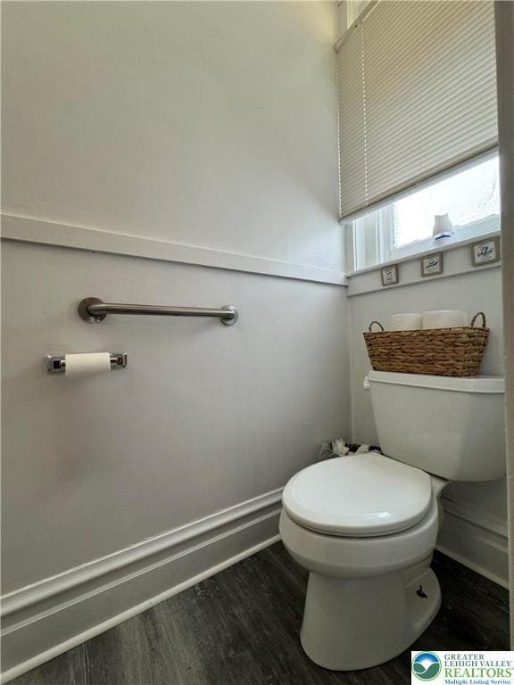 528 N 6th St, Allentown City, PA 18102 - bathroom with toilet, wood finished floors, and baseboards