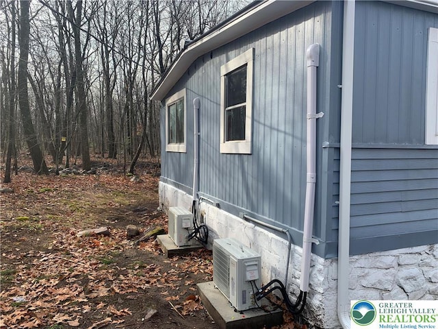 112 Aspen Dr, Penn Forest Township, PA 18210 - view of side of property featuring ac unit