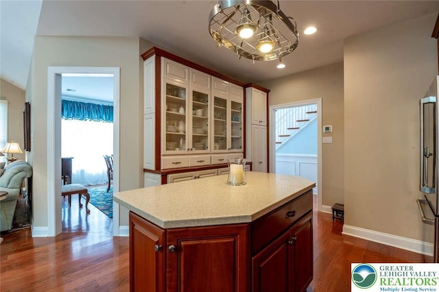 4741 Pinehurst Cir, Upper Saucon Twp, PA 18034 - kitchen featuring dark wood-style floors, glass insert cabinets, a kitchen island, baseboards, and recessed lighting