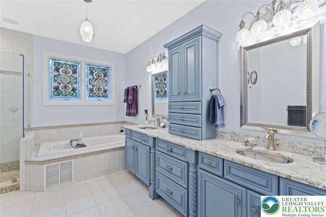 4741 Pinehurst Cir, Upper Saucon Twp, PA 18034 - bathroom with double vanity, a bath, tile patterned floors, and a tile shower