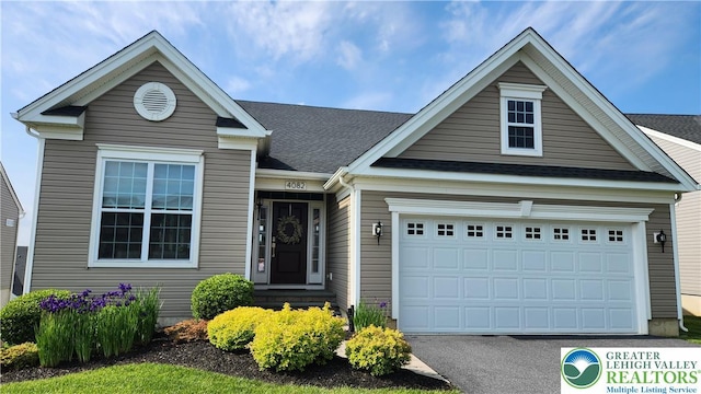 4082 Rutz Ln, South Whitehall Twp, PA 18104 - view of front of home featuring driveway and a garage