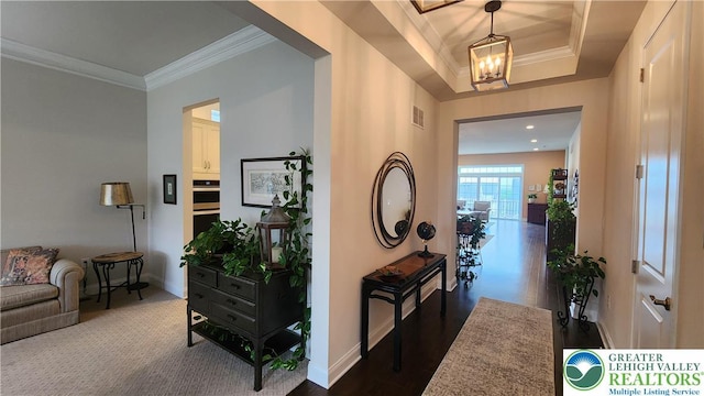 4082 Rutz Ln, South Whitehall Twp, PA 18104 - corridor featuring a chandelier, baseboards, and crown molding