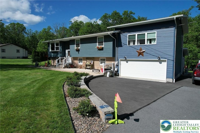 8539 Rextown Rd, Slatington Borough, PA 18080 - view of front facade featuring an attached garage, driveway, and a front lawn