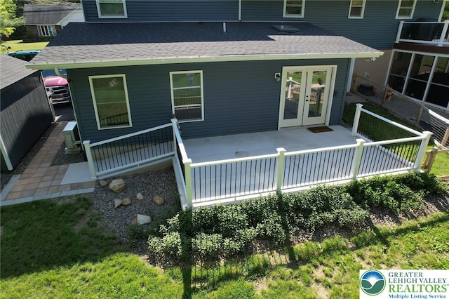8539 Rextown Rd, Slatington Borough, PA 18080 - back of house with french doors and a shingled roof