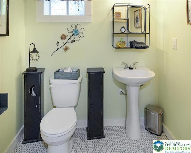 8539 Rextown Rd, Slatington Borough, PA 18080 - bathroom with toilet, tile patterned floors, and baseboards