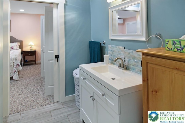 8539 Rextown Rd, Slatington Borough, PA 18080 - bathroom with vanity, backsplash, and baseboards
