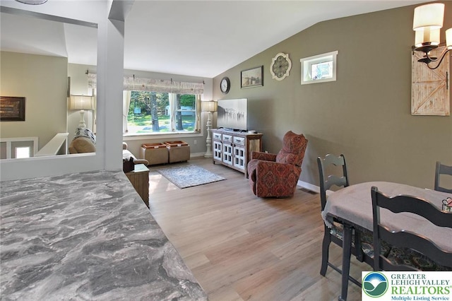 8539 Rextown Rd, Slatington Borough, PA 18080 - bedroom featuring wood finished floors, vaulted ceiling, and baseboards