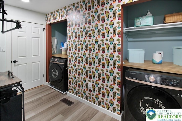 8539 Rextown Rd, Slatington Borough, PA 18080 - washroom with washer / clothes dryer, wood finished floors, wallpapered walls, and baseboards