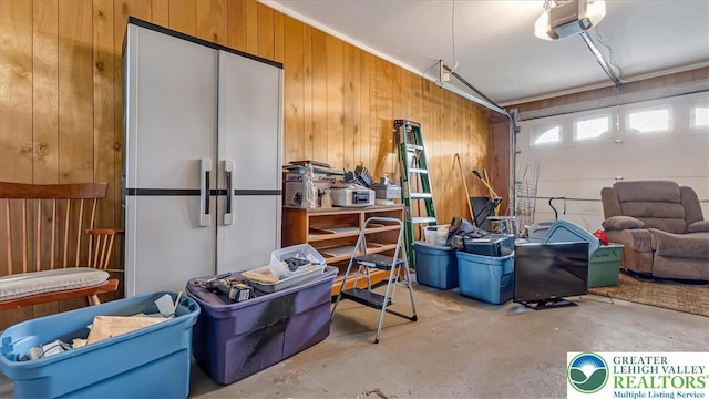 2934 Keystone St, Bethlehem Twp, PA 18020 - garage featuring a garage door opener and wooden walls