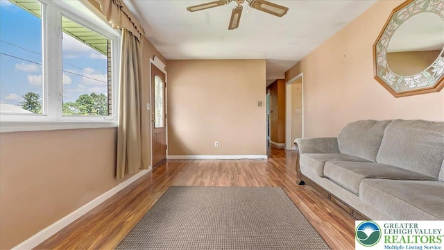 2934 Keystone St, Bethlehem Twp, PA 18020 - living area featuring wood finished floors, ceiling fan, and baseboards